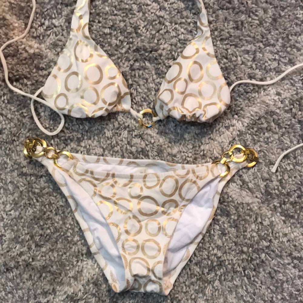 Gold and white VS bathing suit